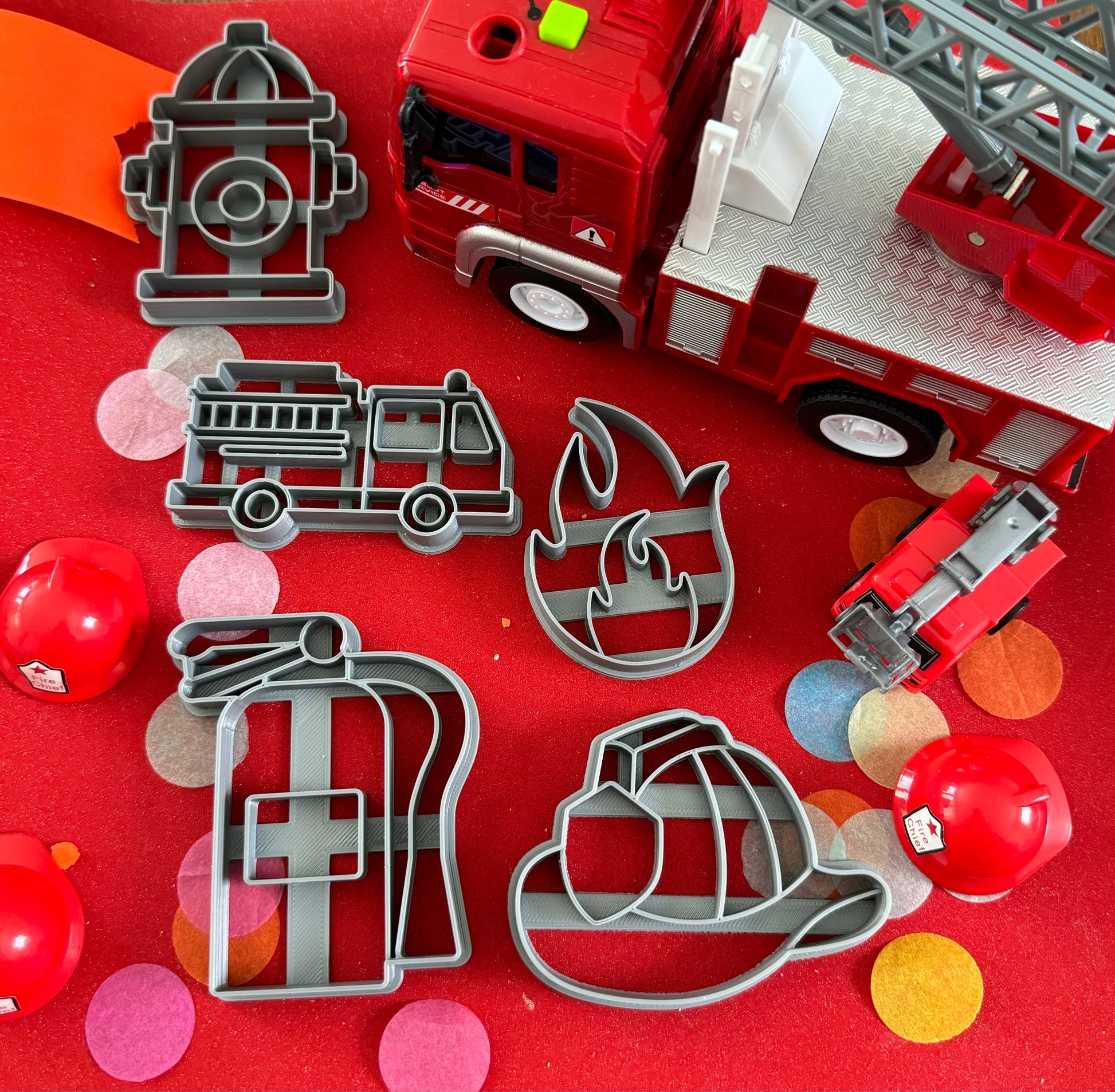 Exciting firefighter-themed sensory kit for kids aged 3 and up, including natural homemade play dough, dough molds, and miniature fire safety toys for imaginative play.