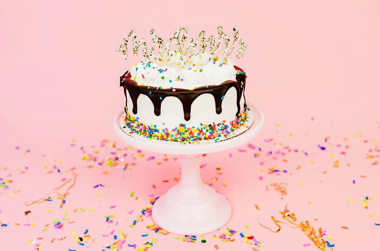 4-pack "Mr & Mrs" cake toppers, acrylic with silver hologram foil, perfect for wedding celebrations.