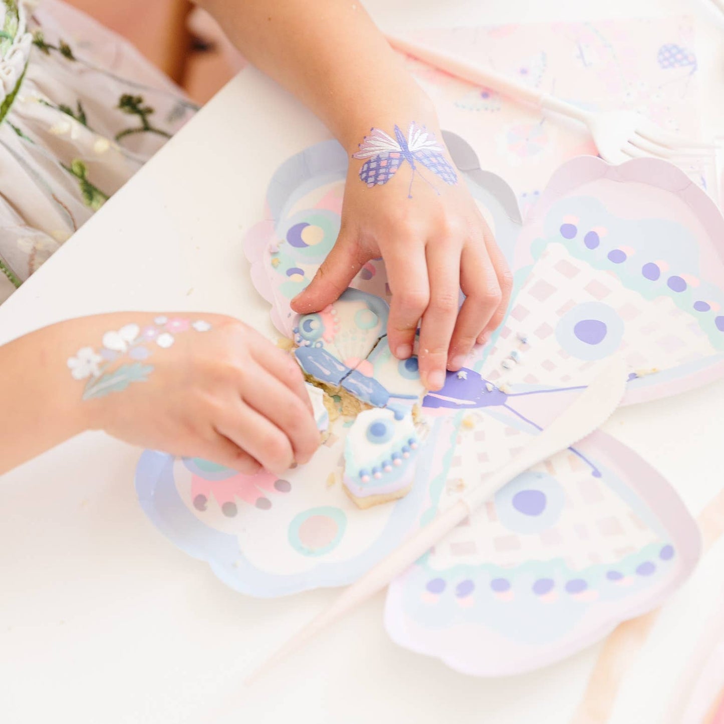 Holographic Silver Foil Butterfly Tattoos Illustrated by Lillian Farag, Safe and Non-Toxic, Package Contains 2 Tattoos (1 Each of 2 Designs), Each Measuring 2.5 Inches Square.