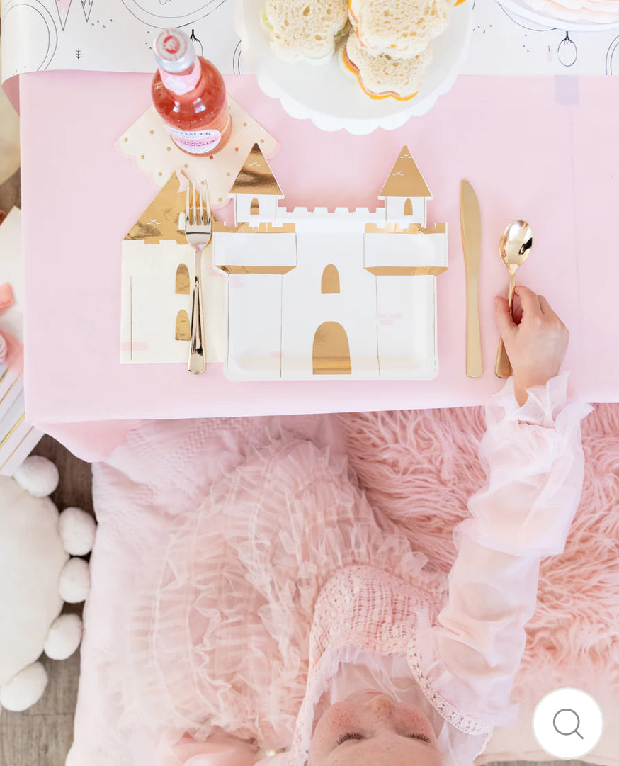 Castle turret-shaped napkins with gold foil accents, perfect for a princess-themed party or fairy tale birthday. Includes 18 paper napkins, measuring 7.5 x 4.5 inches. Pair with castle plates and a princess table runner for a magical party table setting.