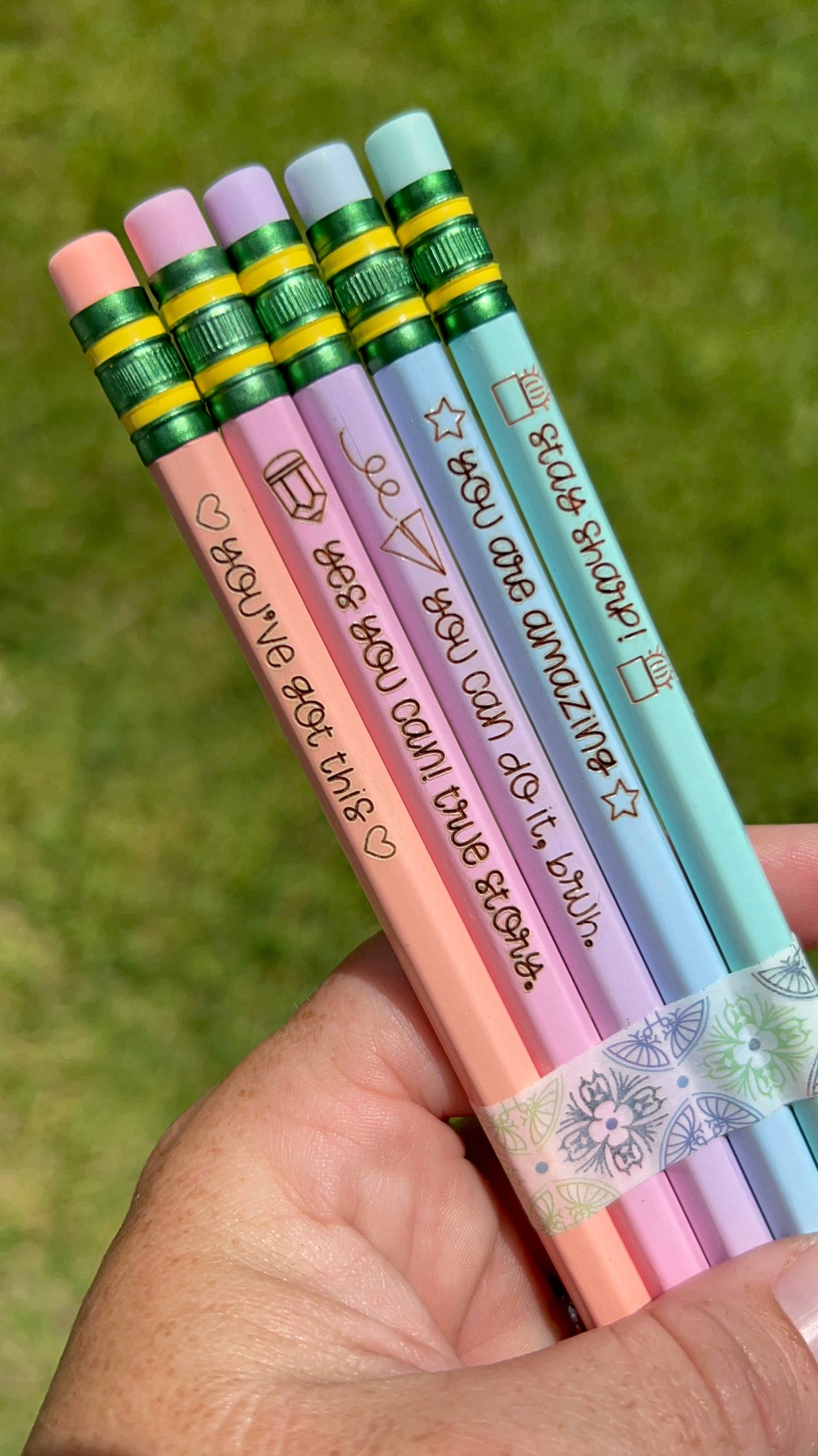 Set of 5 engraved pencils in pastel colors, featuring motivational phrases: "You are amazing," "Stay Sharp," "You can do it, bruh," "Yes you can! True story," and "You've got this." Ideal for back-to-school gifts.