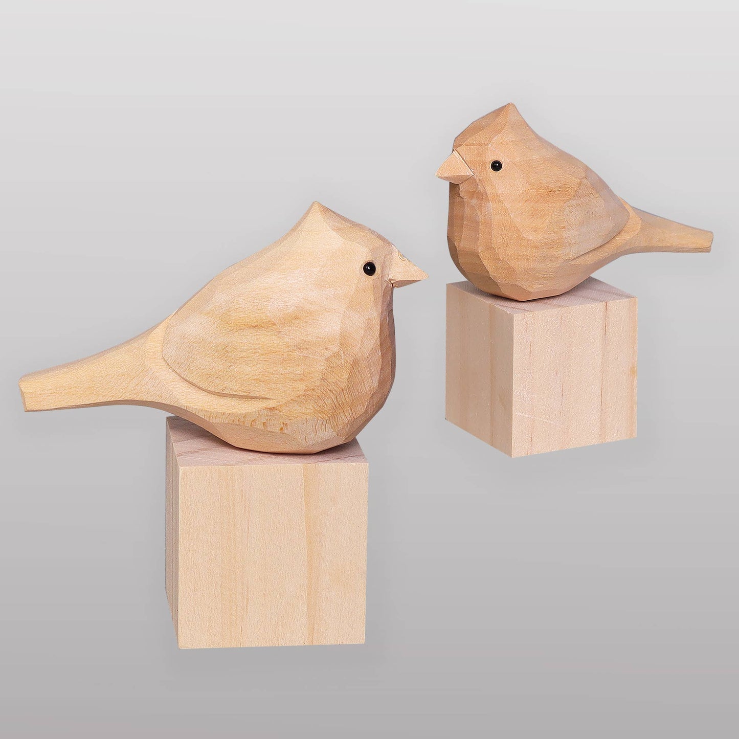 Nest and hand-painted cardinals for display