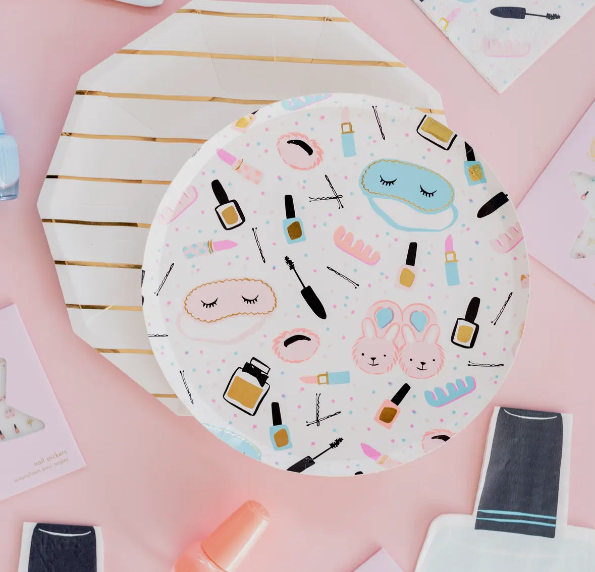 Slumber party plates with neon pops and shiny gold foil accents, perfect for sleepover and spa-themed events. Illustrated by Hello!Lucky for Daydream Society. Set includes 8 paper plates, each 8.25 inches in diameter. Not microwave safe.