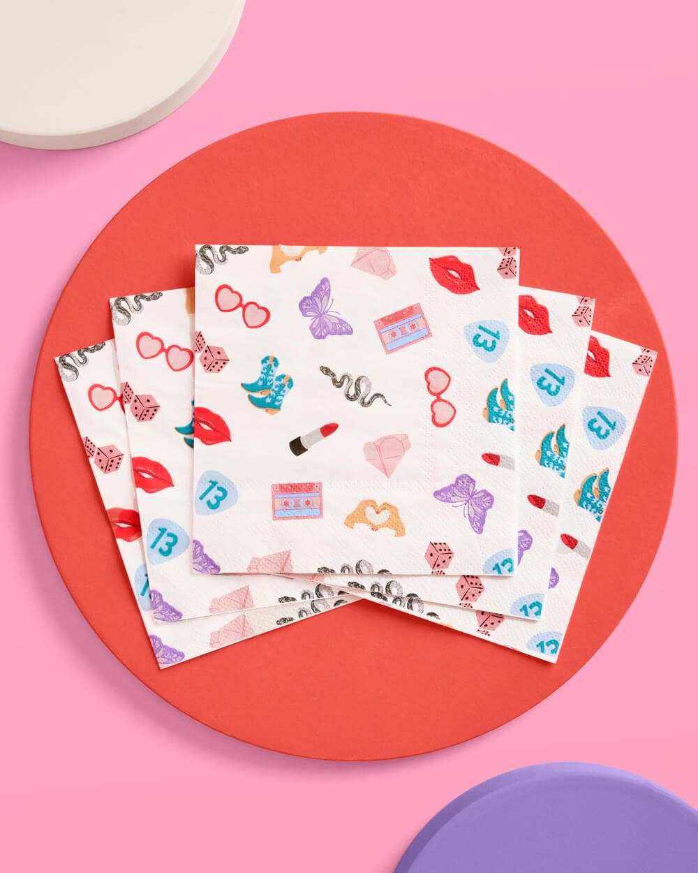 Era-themed white paper napkins with icons