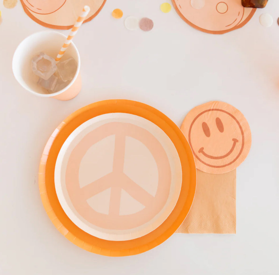 Peace and Love collection paper napkins featuring retro-chic designs of peace, love, and daisies. Package contains 20 napkins, each measuring approximately 5 inches folded. Perfect for mix-and-match decor.