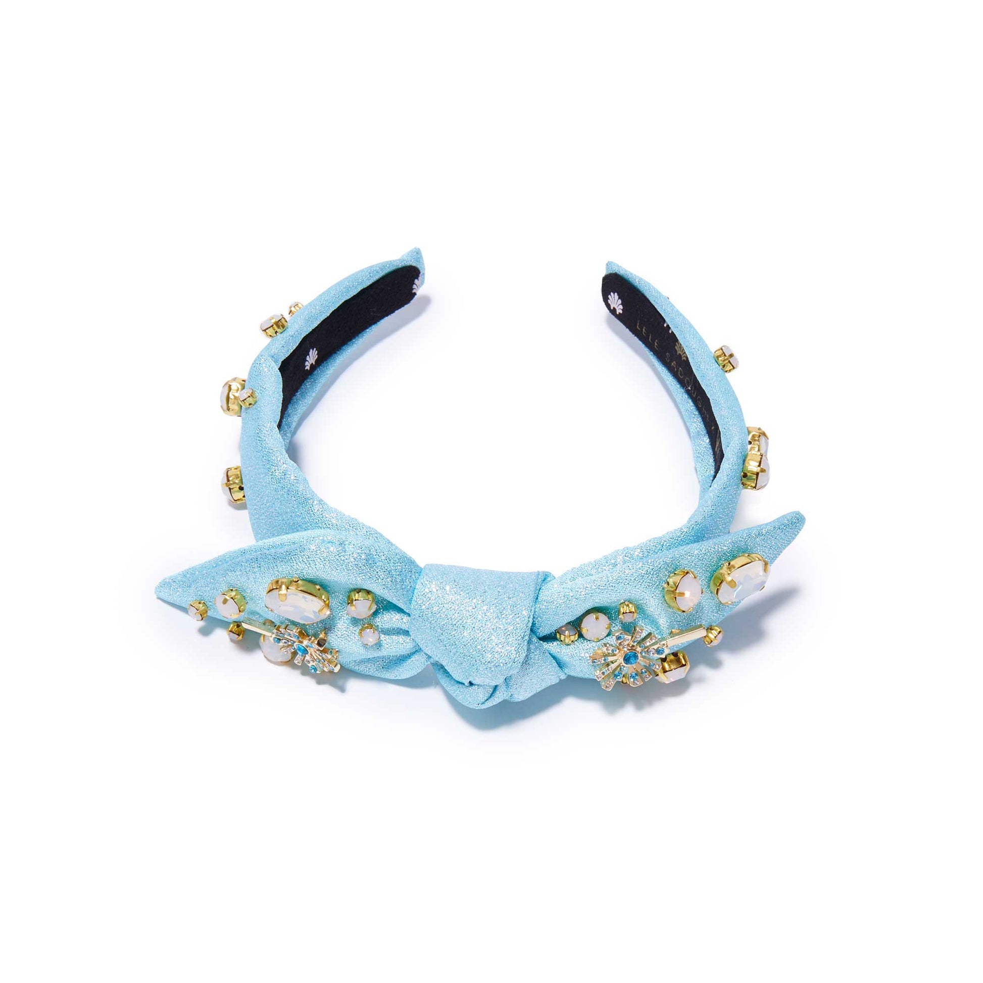 Lele Sadoughi x Wicked Headband, NY Broadway Collaboration, Wicked 25th Anniversary Accessories, Glinda-Inspired Magical Wand Design, Bubble Blue Poly Blend Headband, Hand-Embellished Oval Opals & Round Crystals, 14k Gold-Plated Wand Charms, Comfort Fit Band for Ages 3-9, Trademark Logo Charm, Spot Clean, Custom Collaboration Pouch Included, Stylish & Comfortable NYC Design, High-Quality Fabrics & Hand-Sewn Trims, Iconic Wicked Accessories, Perfect Gift for Broadway Fans, Unique Collaboration Headband, Lele