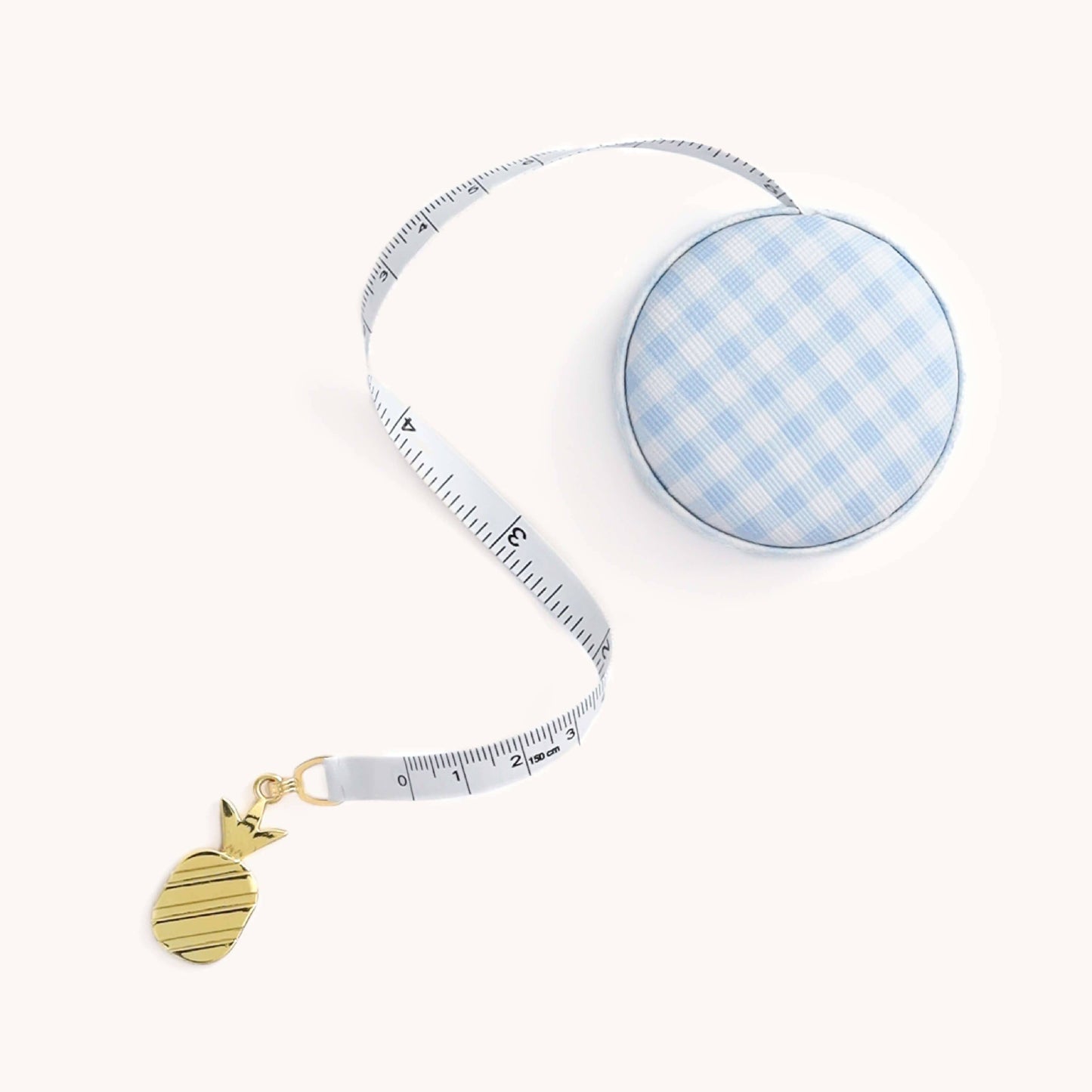 60" retractable measuring tape with a hidden button release, wrapped in elegant Carolina gingham.