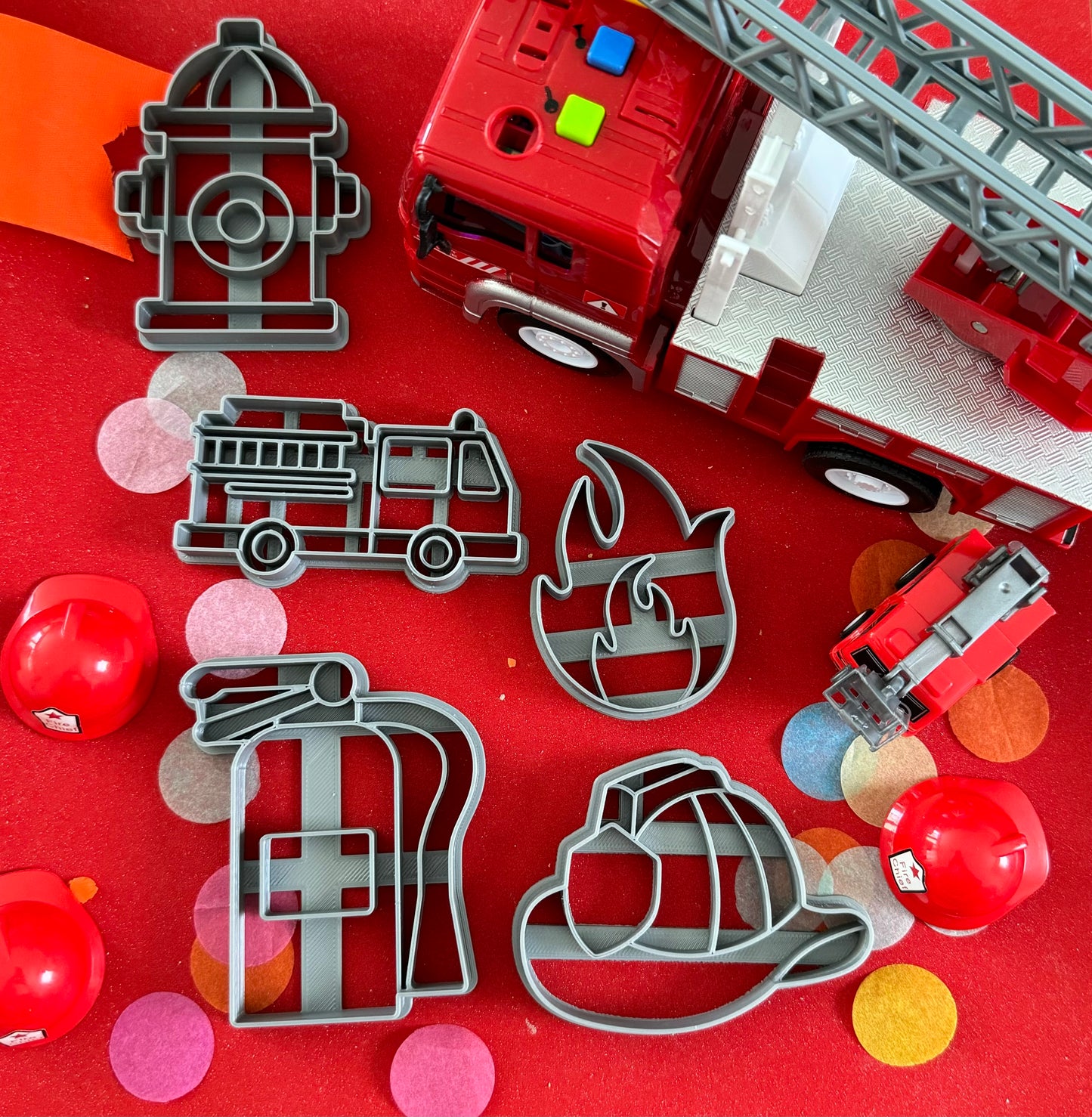 Exciting firefighter-themed sensory kit for kids aged 3 and up, including natural homemade play dough, dough molds, and miniature fire safety toys for imaginative play.