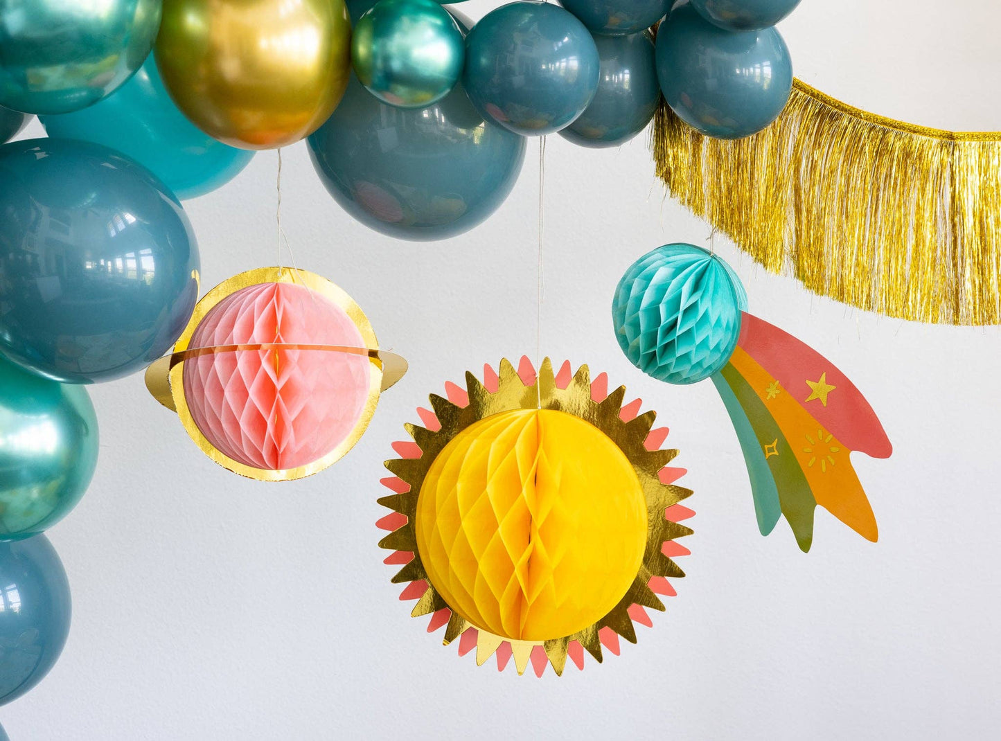 Galaxy-themed hanging planet set, 16”, 13.5”, 11” honeycomb decorations with foil accents.