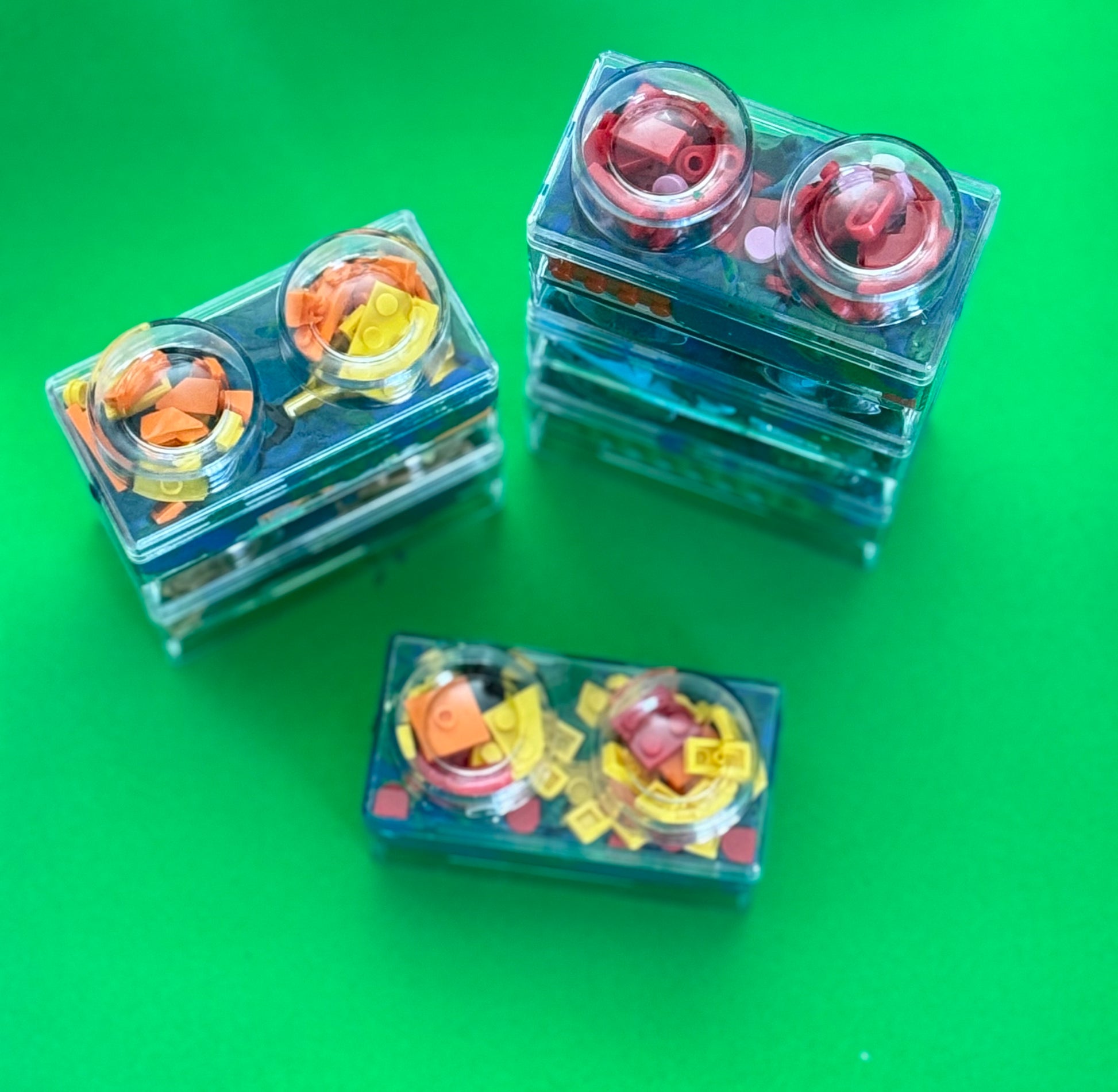 Building Block Robot Sensory Kit featuring handmade blue/green glitter dough, building blocks, and sensory toys. Designed for sensory exploration, creative play, and fine motor skill development, this kit provides a magical, hands-on experience for kids ages 3 and up.