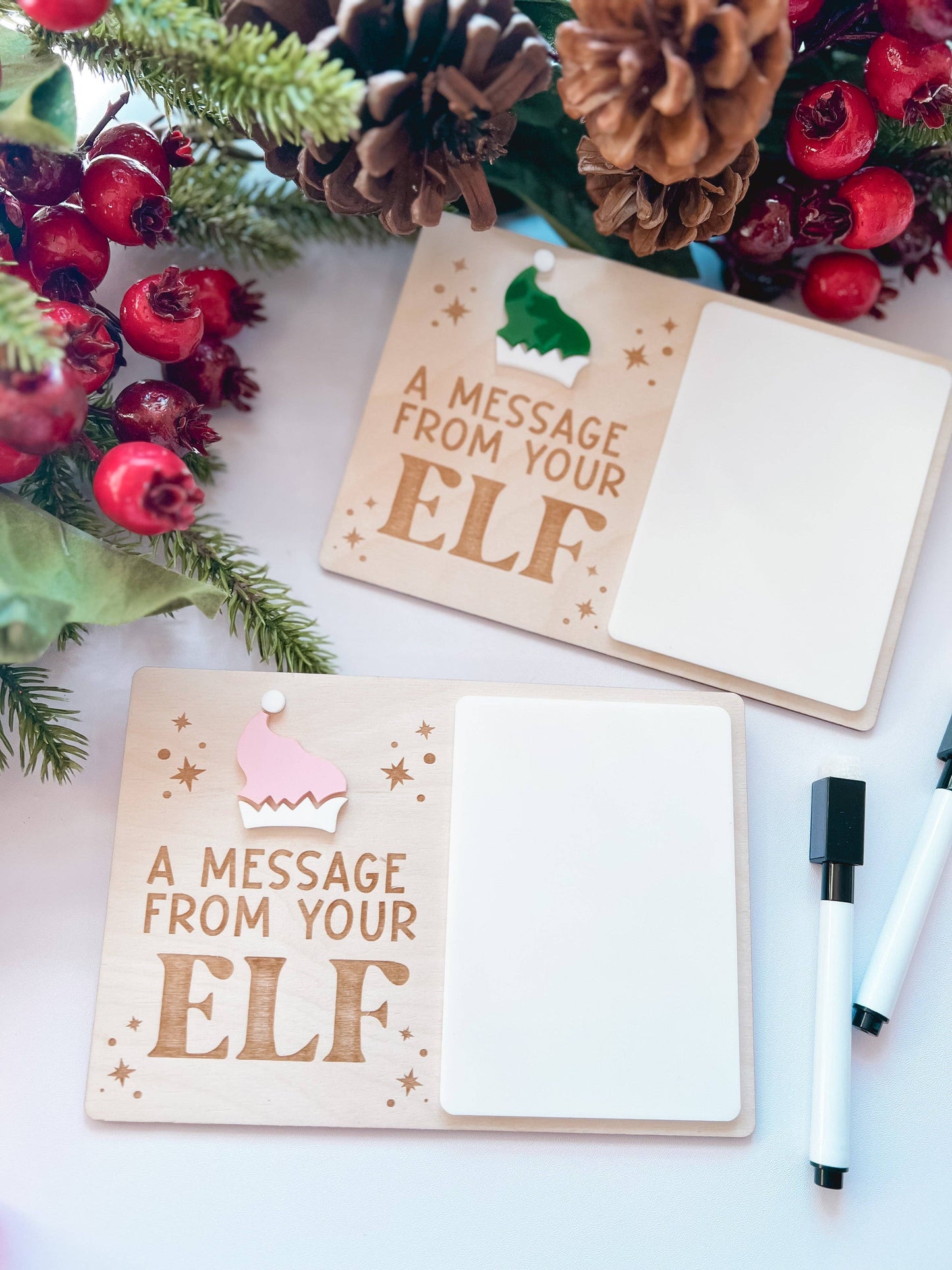 Elf welcome back note board on wood