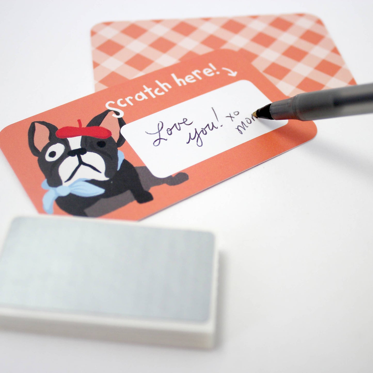 Set of 24 assorted scratch-off lunchbox notes measuring 2” x 3.5”, featuring six different animated animal friends designs. Each card allows you to write a personalized message in the blank space, which is then covered with a scratch-off sticker for a fun reveal. Perfect for slipping into lunch bags or coat pockets, these tiny notes come packaged in a clear plastic box, making them an ideal surprise for someone special.
