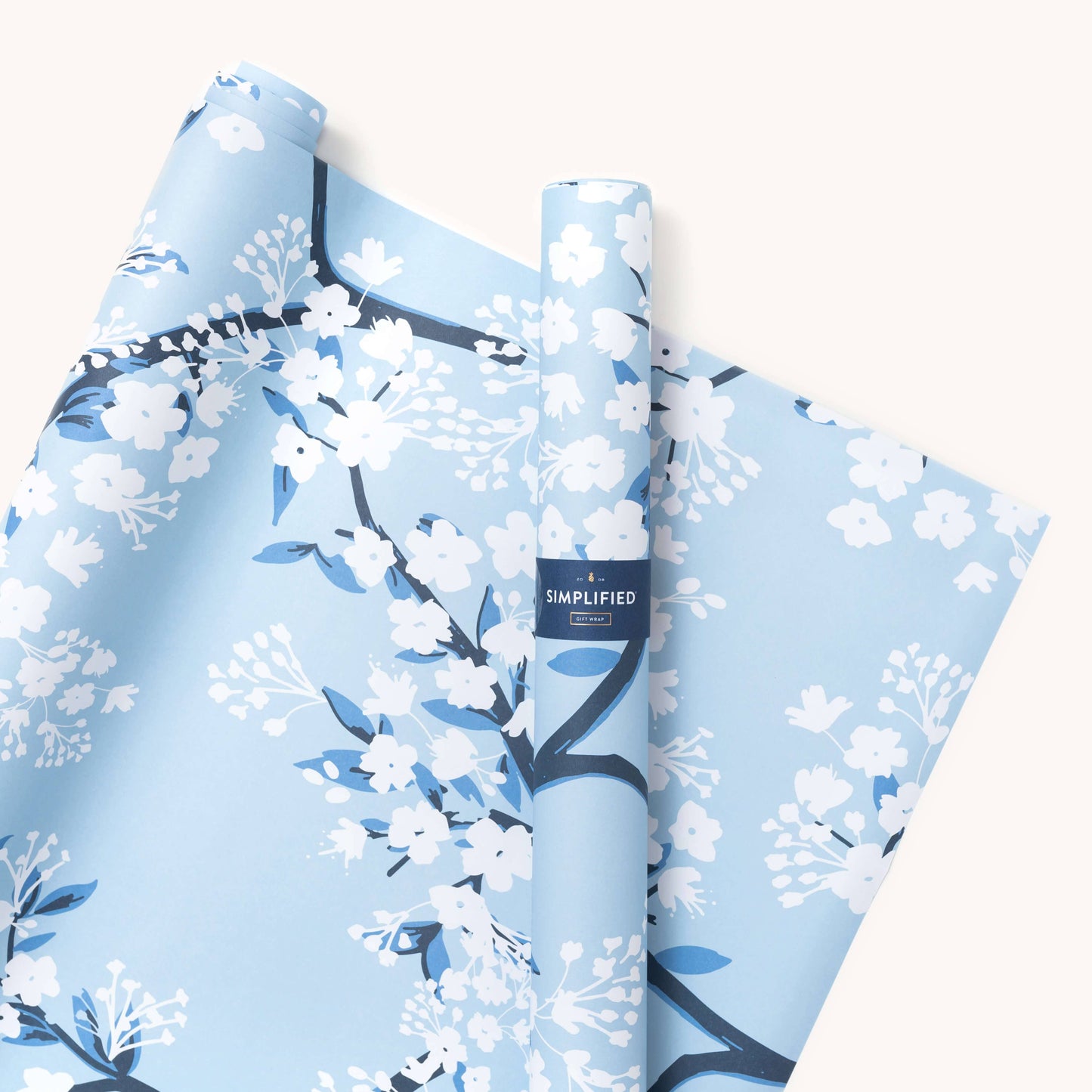 Elegant cherry blossoms gift wrap sheets with hand-painted blue and white floral design for special gifts.