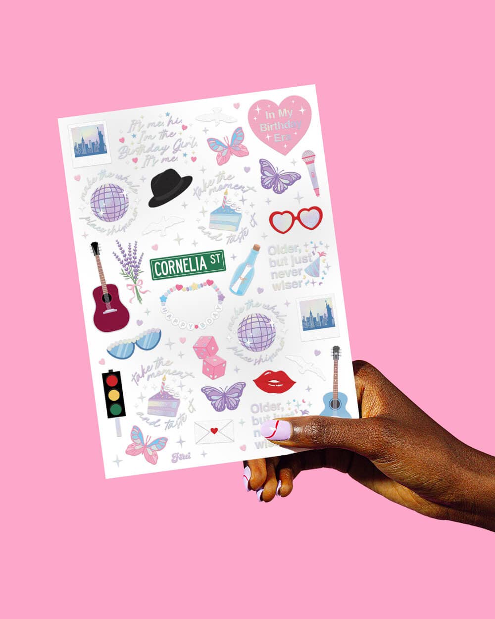 Iridescent Swiftie tattoos on 2 colorful sheets