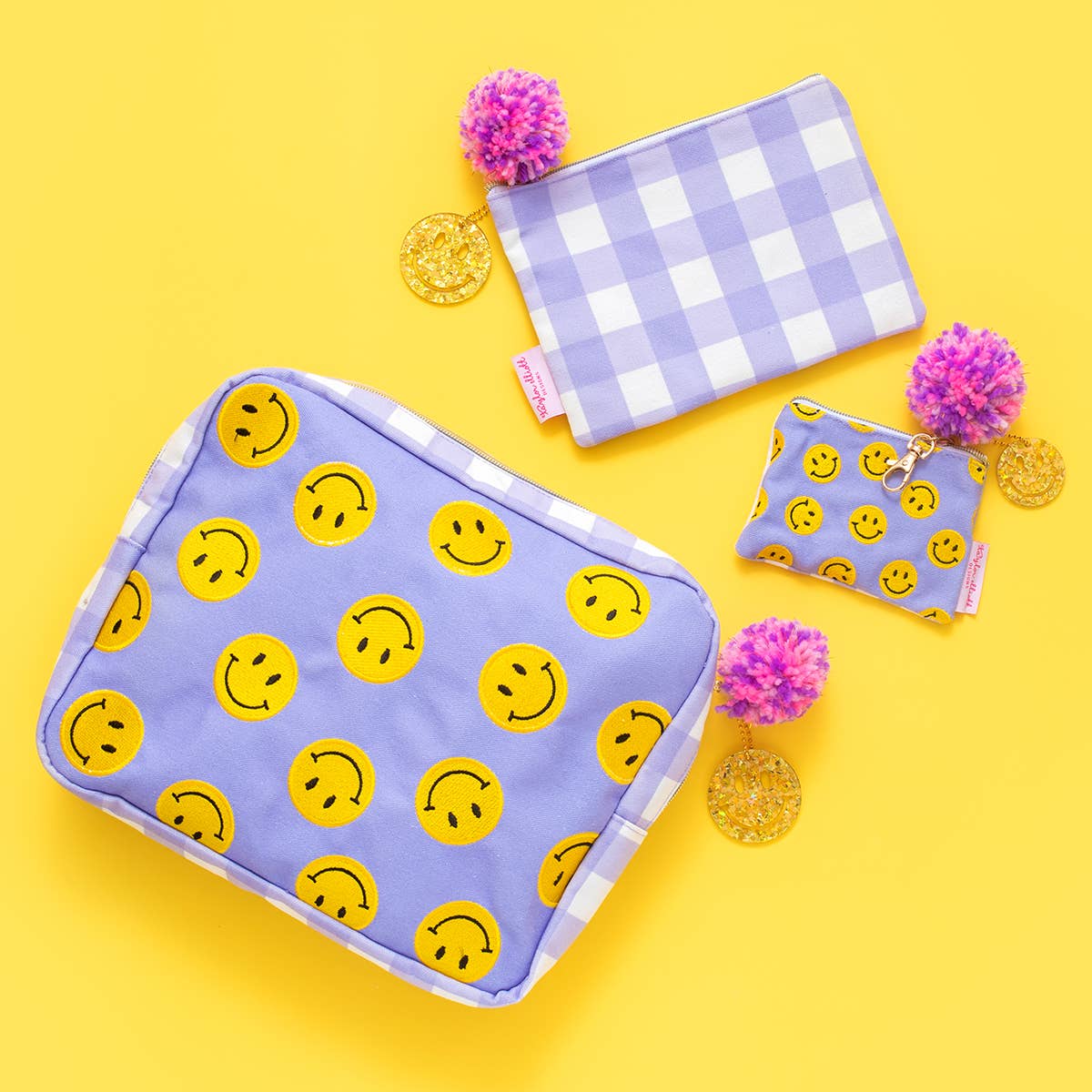 Medium Smiley Pouch: Versatile organizer, makeup bag, or pencil pouch with embroidered smiley, pom-pom details.