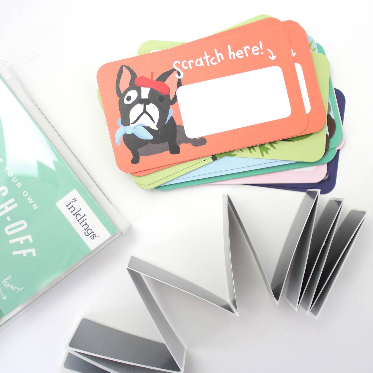 Set of 24 assorted scratch-off lunchbox notes measuring 2” x 3.5”, featuring six different animated animal friends designs. Each card allows you to write a personalized message in the blank space, which is then covered with a scratch-off sticker for a fun reveal. Perfect for slipping into lunch bags or coat pockets, these tiny notes come packaged in a clear plastic box, making them an ideal surprise for someone special.