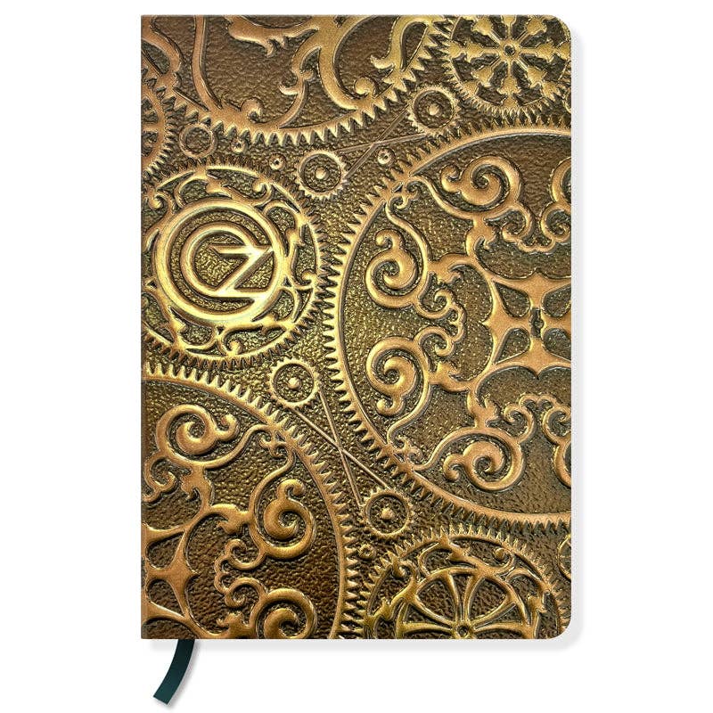 Notebook with intricate gold mechanical design on a white background