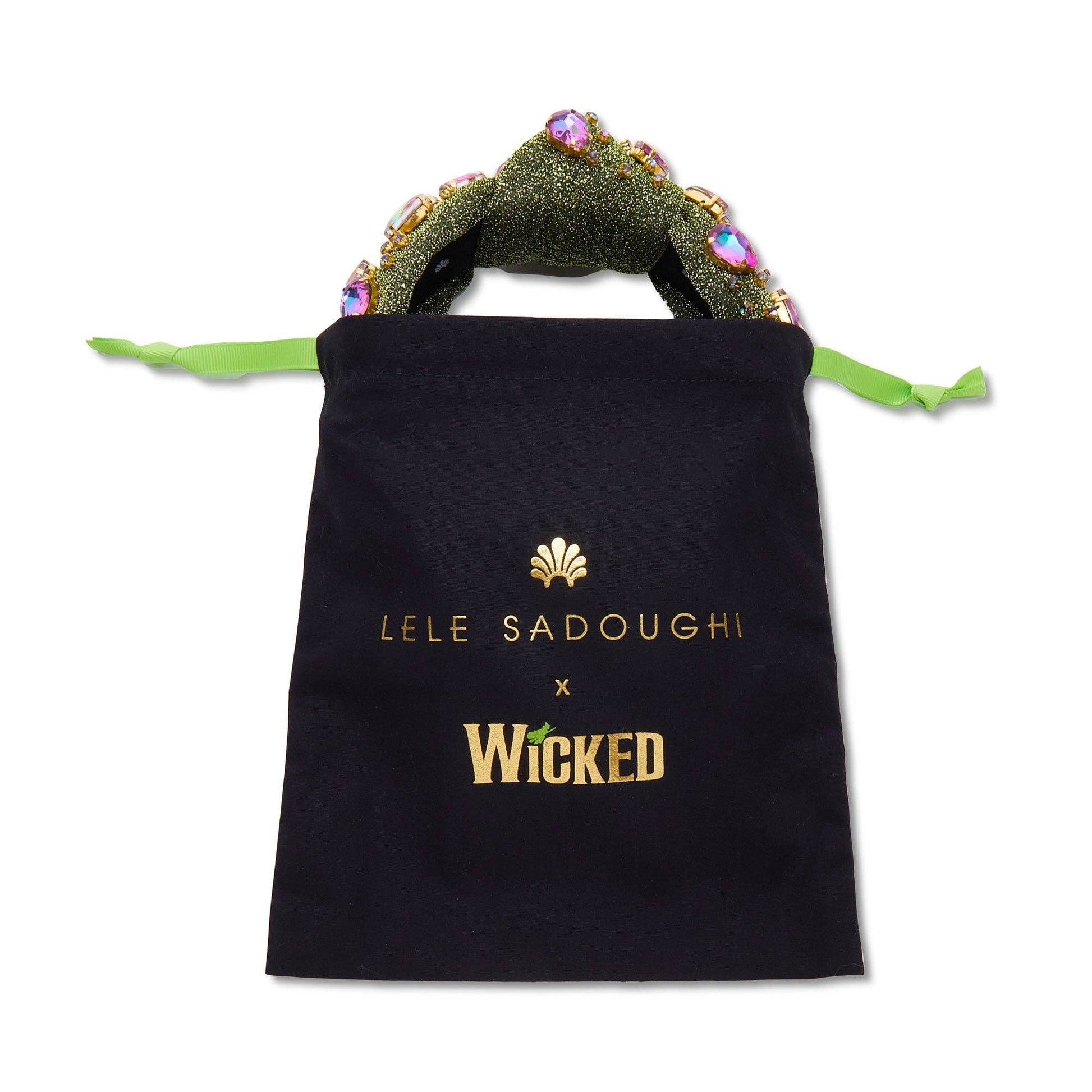 Lele Sadoughi x Wicked Headband, NY Broadway Collaboration, Wicked 25th Anniversary Accessories, Glinda-Inspired Magical Wand Design, Bubble Blue Poly Blend Headband, Hand-Embellished Oval Opals & Round Crystals, 14k Gold-Plated Wand Charms, Comfort Fit Band for Ages 3-9, Trademark Logo Charm, Spot Clean, Custom Collaboration Pouch Included, Stylish & Comfortable NYC Design, High-Quality Fabrics & Hand-Sewn Trims, Iconic Wicked Accessories, Perfect Gift for Broadway Fans, Unique Collaboration Headband, Lele