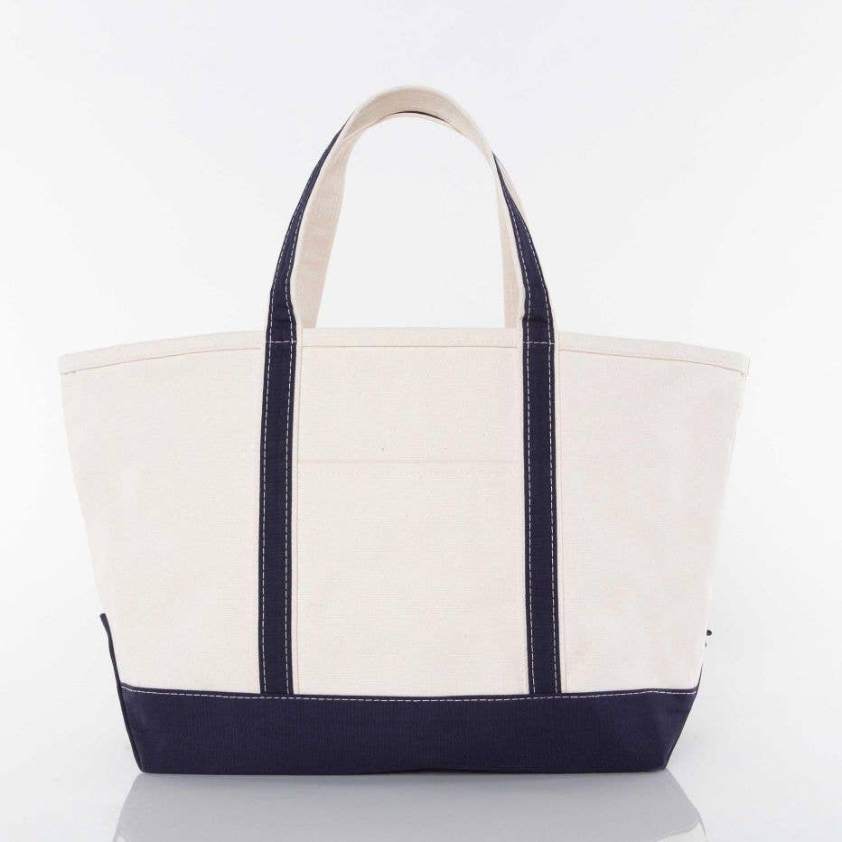Personalized canvas tote with zip closure, exterior pocket, large and medium sizes available