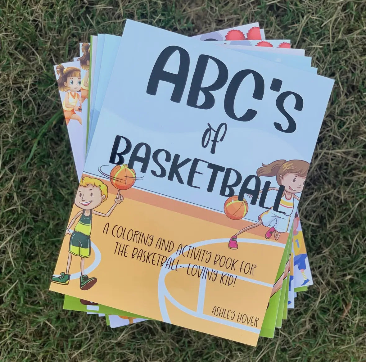 Basketball Coloring Books Party Favors featuring basketball-themed covers, with each book containing over 70 pages for coloring. Perfect for ages 1-8, ideal as birthday party favors, classroom giveaways, and more. Each coloring book measures approximately 11 inches tall by 8.5 inches wide.