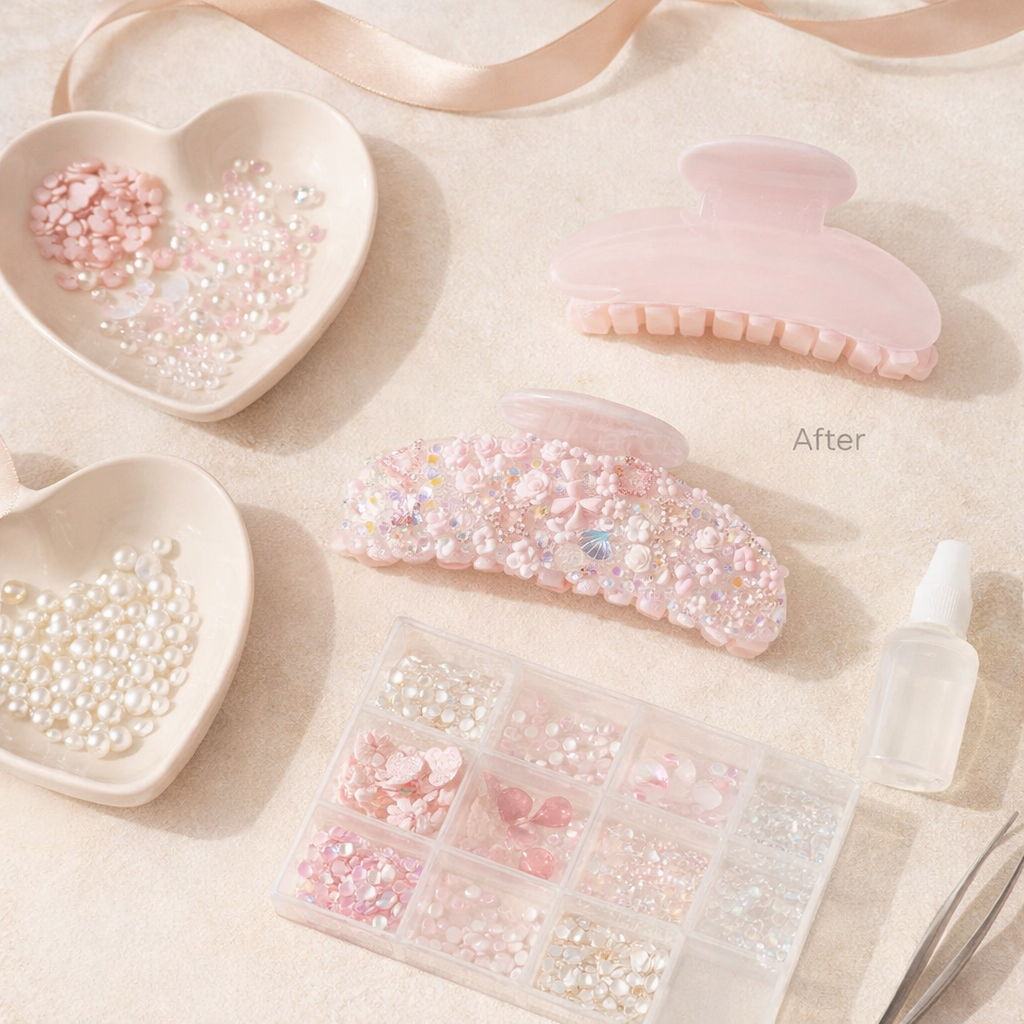 Pink hair clips with decorative elements on a beige surface