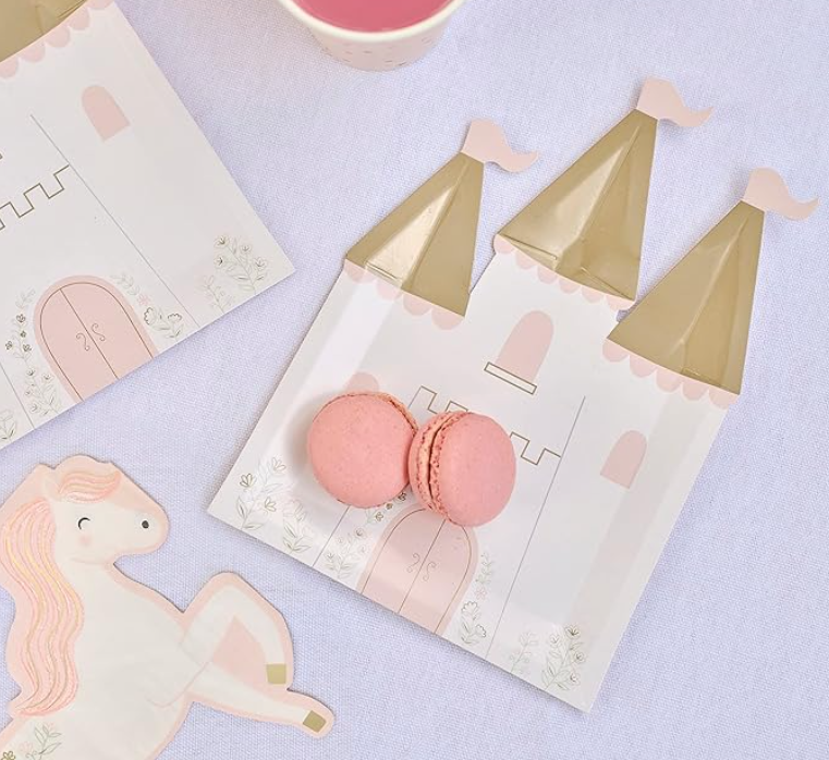 Princess party plates shaped like castles with shimmering gold turrets