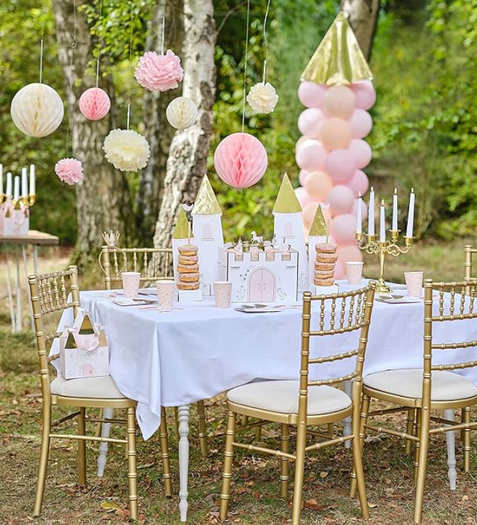 Princess castle party plates with detailed gold accents and soft pink hues.