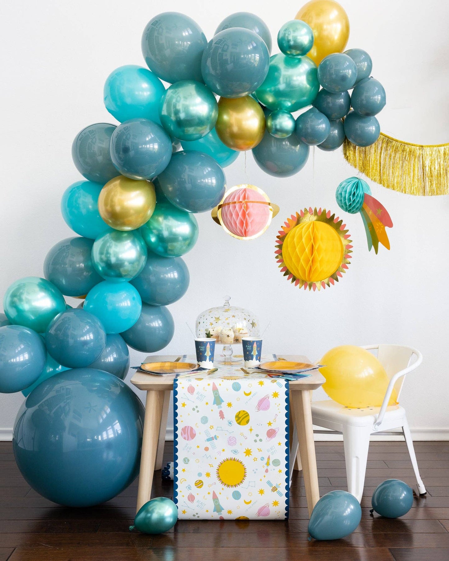 Galaxy paper table runner, 16” x 120”, playful space design for cosmic celebrations.