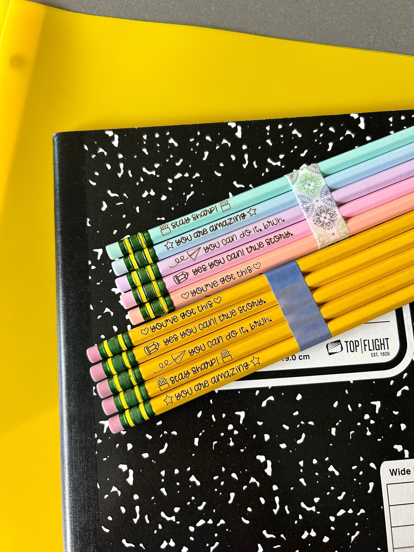 Set of 5 engraved pencils in pastel colors, featuring motivational phrases: "You are amazing," "Stay Sharp," "You can do it, bruh," "Yes you can! True story," and "You've got this." Ideal for back-to-school gifts.