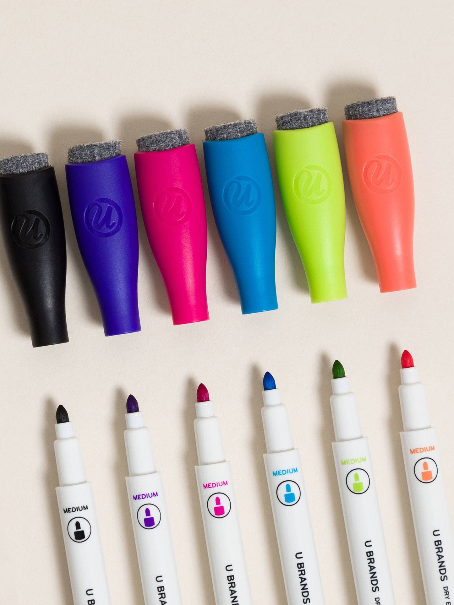 Dry erase pens with built in erasers on caps