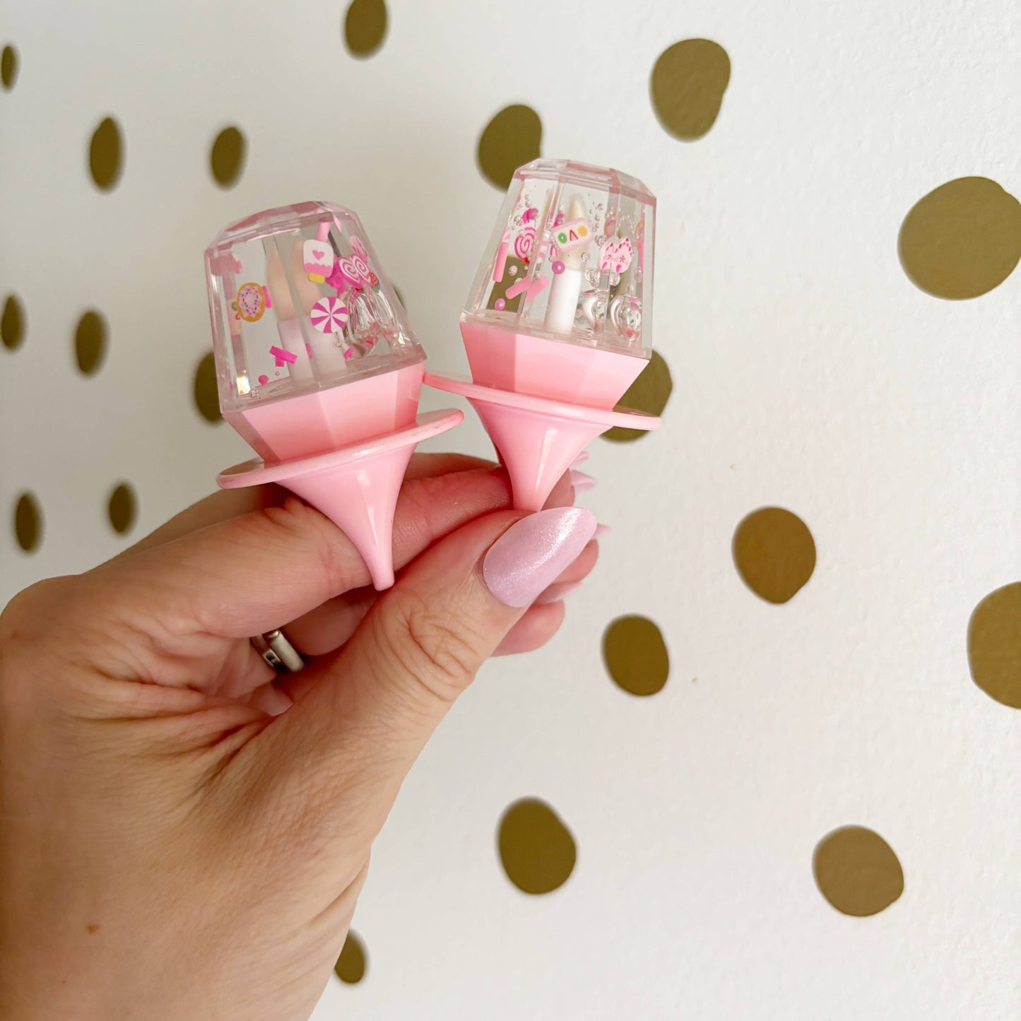 Bubble gum flavored Christmas lip gloss with gingerbread house donut, candy ring pop, moisturizing gift.