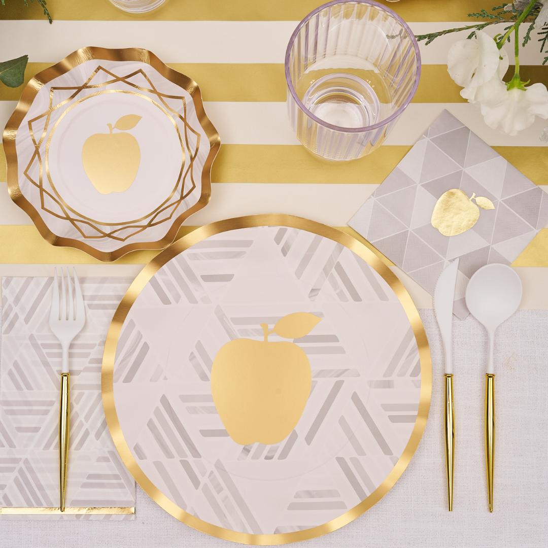Black and white paper napkins with gold accents