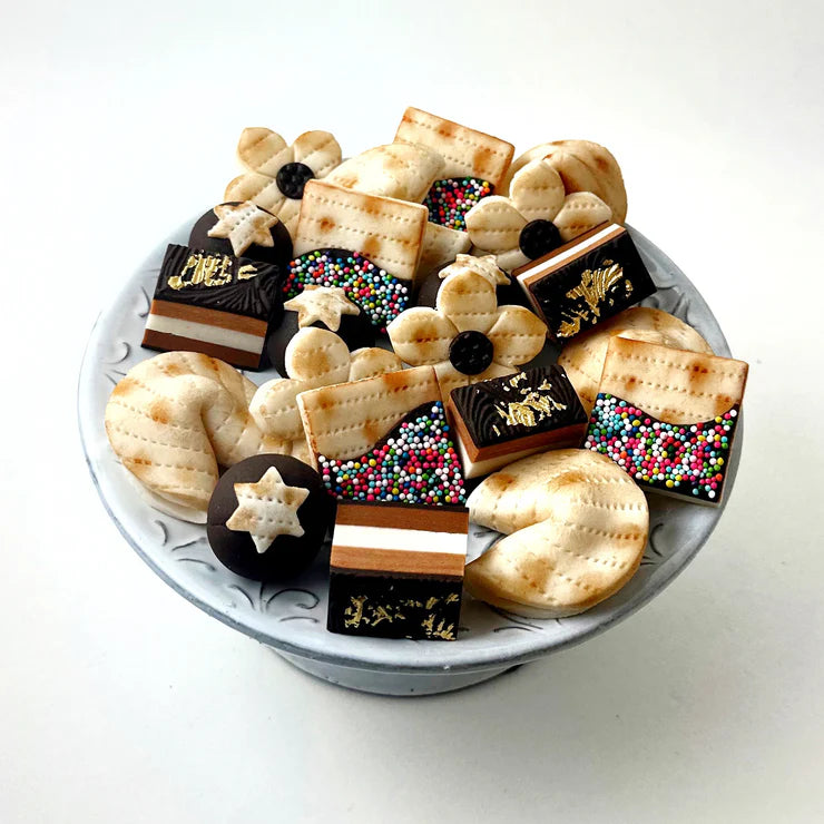 20-piece Passover Perfection gift box – festive marzipan treats like star of David truffles and more.