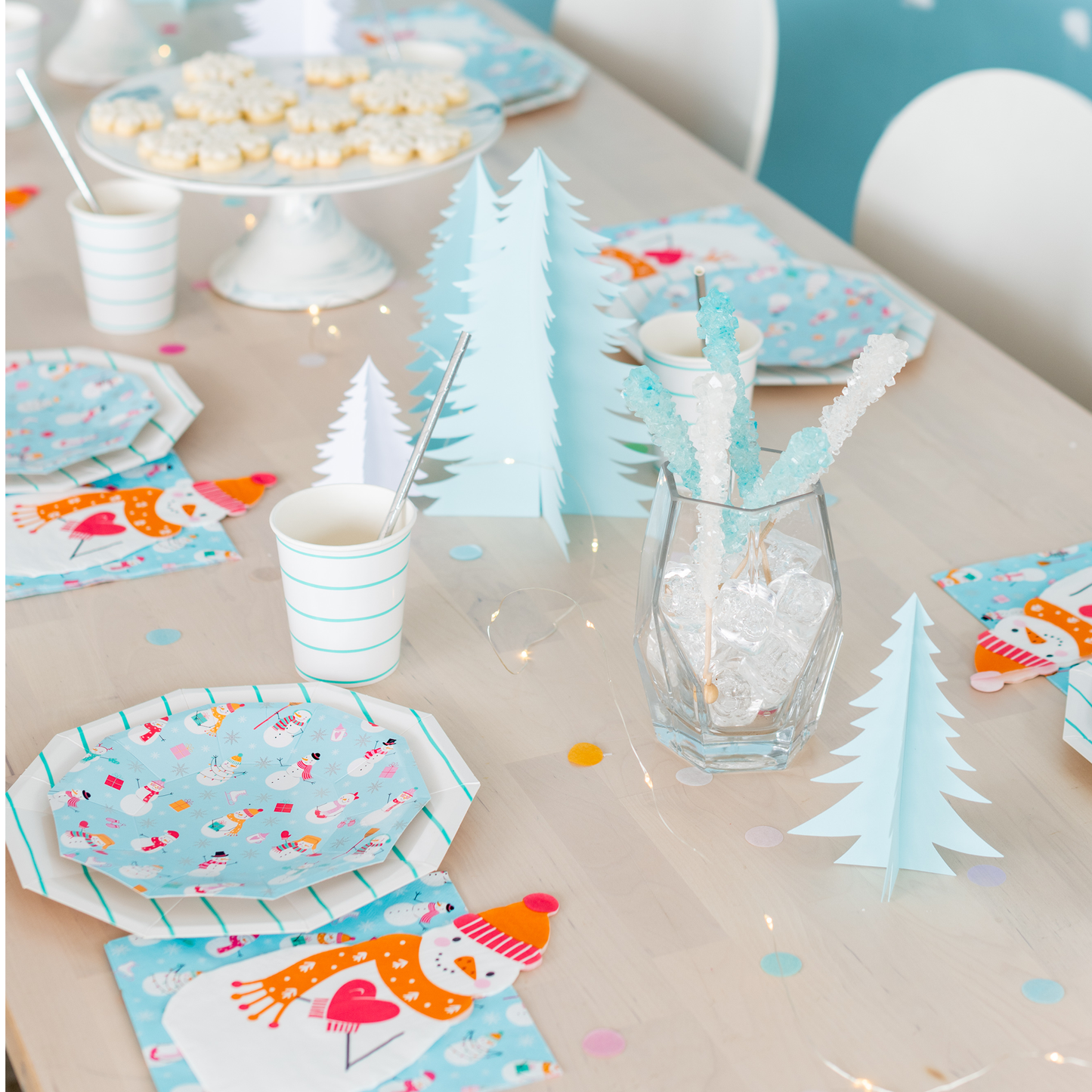 Winter pastel paper plates with cheerful snowman design