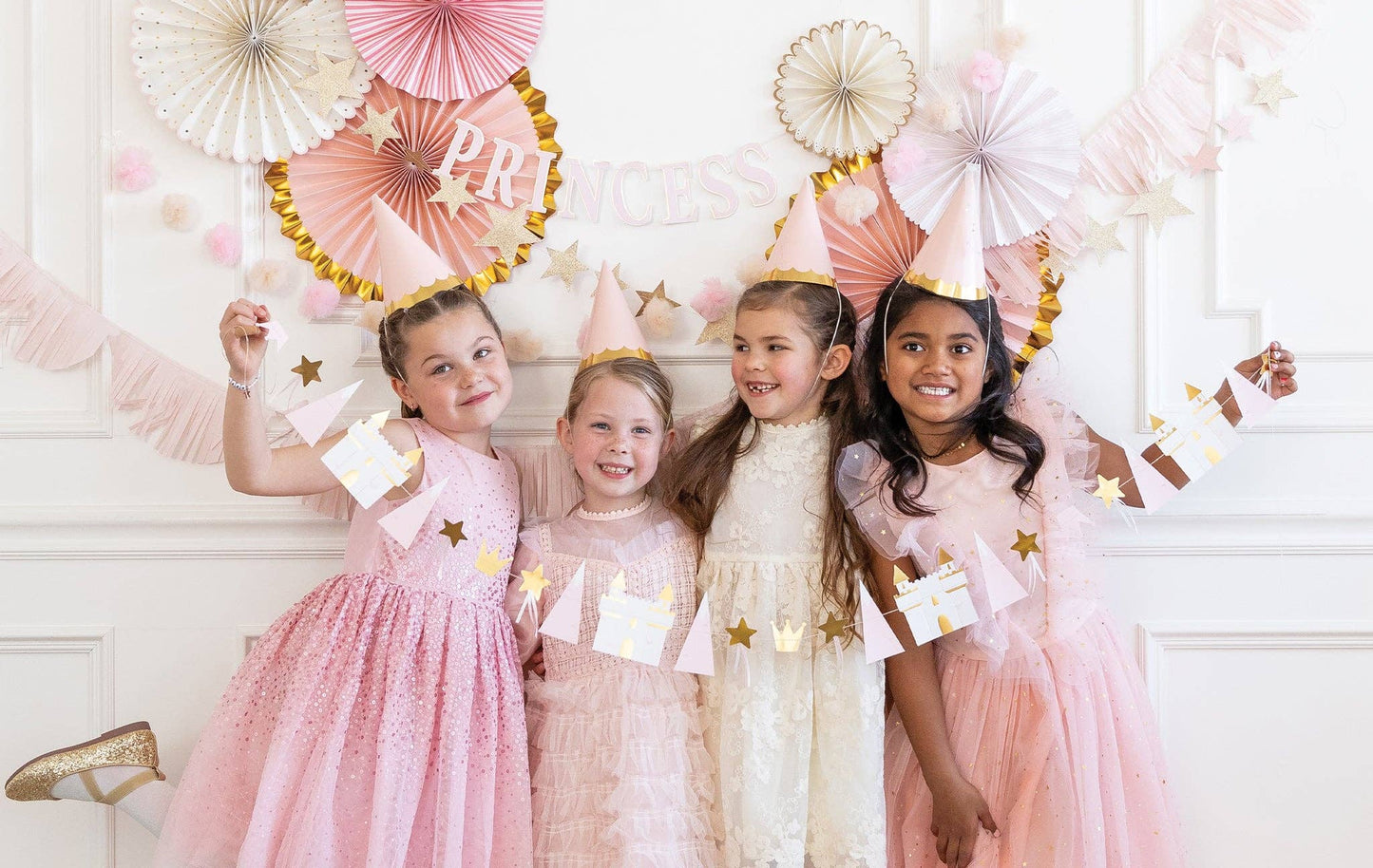 Dream Big Sparkle More banner featuring crowns, castles, and wands for princess parties