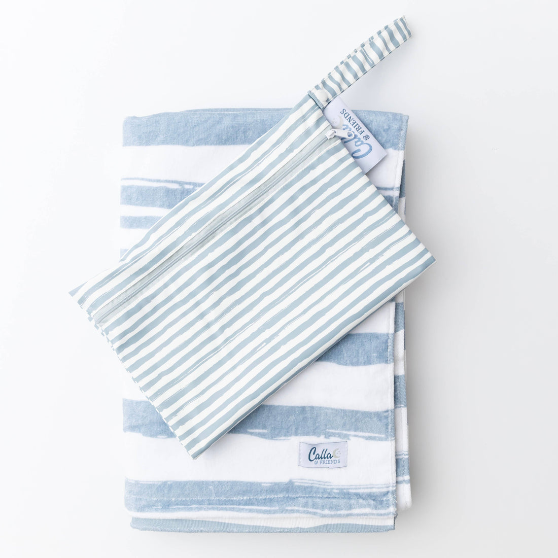 Kids beach towels for pool season — The Kenzie beach towel in brush stripes