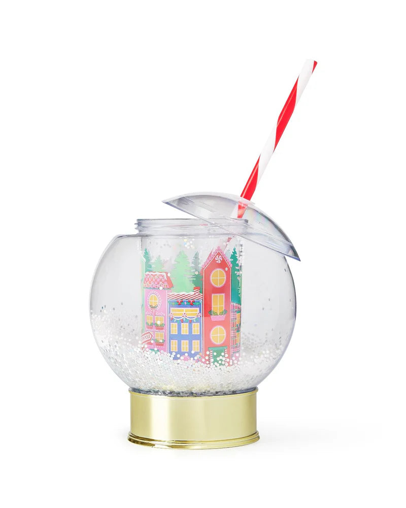 Shake up your holiday drinks with this 12 oz snow globe-shaped cup, featuring a holiday village and shakeable confetti. Perfect for festive parties or as a unique gift. BPA-free and hand wash only. Dimensions: 10.5" x 5" x 5" (including straw).