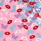 Taylor-inspired foil confetti with boots, lips, and guitars