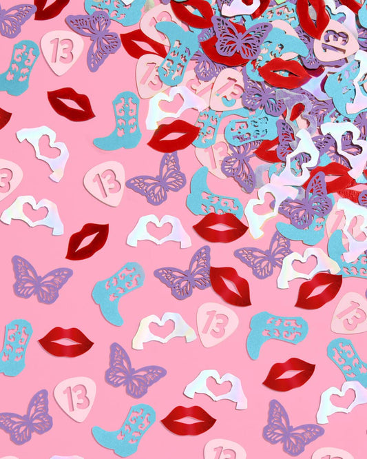Taylor-inspired foil confetti with boots, lips, and guitars