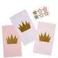 Princess-themed paper treat bags in blush, pale pink, and lavender, each featuring a gold-foiled crown. Includes 24 bags with 24 gold-accented star sticker seals. Perfect for princess parties, ladies night out, or bunco party favors. Excitement guaranteed!"