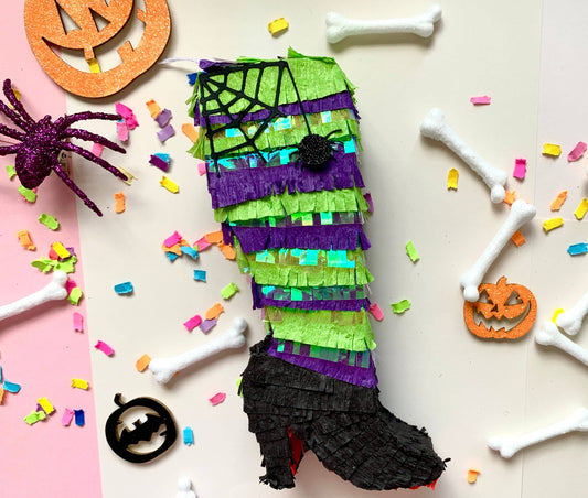 Halloween Witch Leg Mini Piñata, Ideal for Halloween Decorations and Party Favors, Measures 7 inches Tall, 3 inches Long, and 1.5 inches Wide, Features Trap Door for Treats.