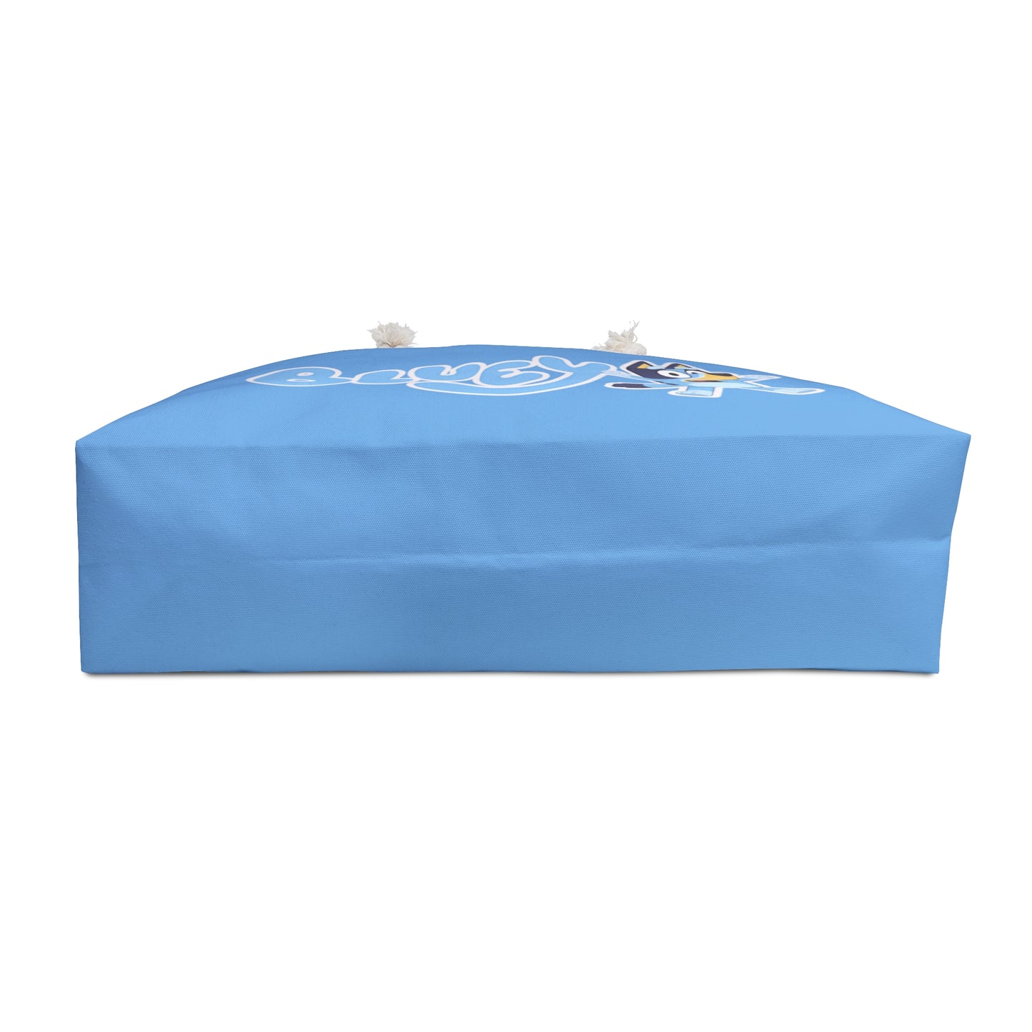 Oversized Bluey themed beach bag featuring a playful design inspired by the episode "The Pool," perfect for family adventures at the beach or pool. The durable tote measures 24" x 13" and includes thick rope handles for easy carrying.