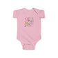 Trendy Cowboy Ghost Trick or Treat baby onesie featuring a cute ghost in a cowboy outfit holding a candy bag. Made from 100% combed ringspun cotton, this short-sleeved bodysuit is comfortable, lightweight, and perfect for baby boys or girls aged 6M-24M.