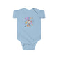 Trendy Cowboy Ghost Trick or Treat baby onesie featuring a cute ghost in a cowboy outfit holding a candy bag. Made from 100% combed ringspun cotton, this short-sleeved bodysuit is comfortable, lightweight, and perfect for baby boys or girls aged 6M-24M.