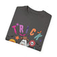 Trick or Treat Cowboy Ghost shirt featuring a playful cowboy ghost design and melty font. Available in unisex sizes S-3XL, this ultra-soft, garment-dyed 100% ring-spun cotton t-shirt is perfect for Halloween celebrations for adults and teens.