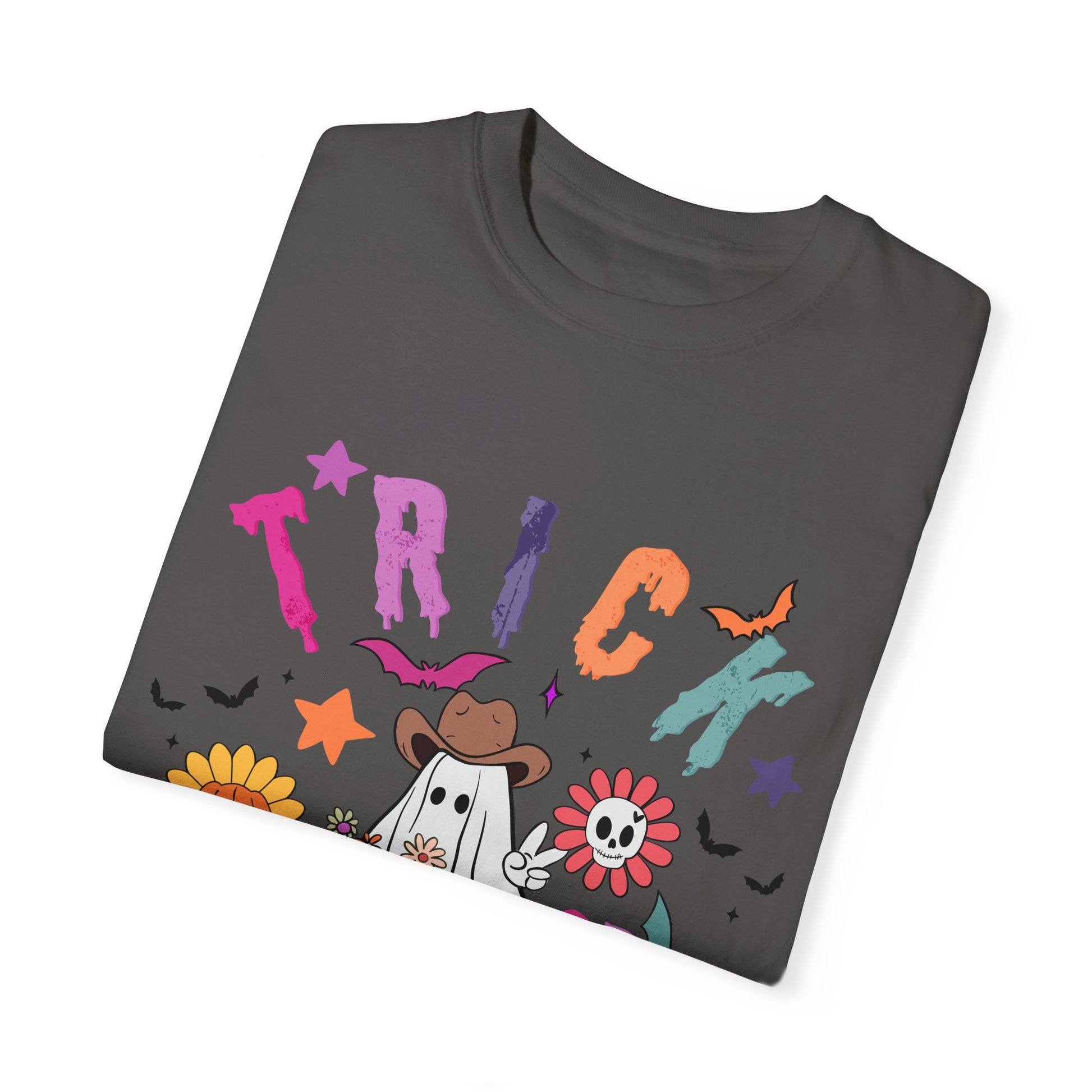 Trick or Treat Cowboy Ghost shirt featuring a playful cowboy ghost design and melty font. Available in unisex sizes S-3XL, this ultra-soft, garment-dyed 100% ring-spun cotton t-shirt is perfect for Halloween celebrations for adults and teens.