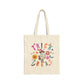Halloween Cowboy Ghost Trick or Treating bag made from durable natural canvas, featuring a colorful ghost design. This 15" x 16" tote with 20" handles is perfect for kids, teachers, and Halloween lovers to collect candy, carry books, or use as a festive fall bag.