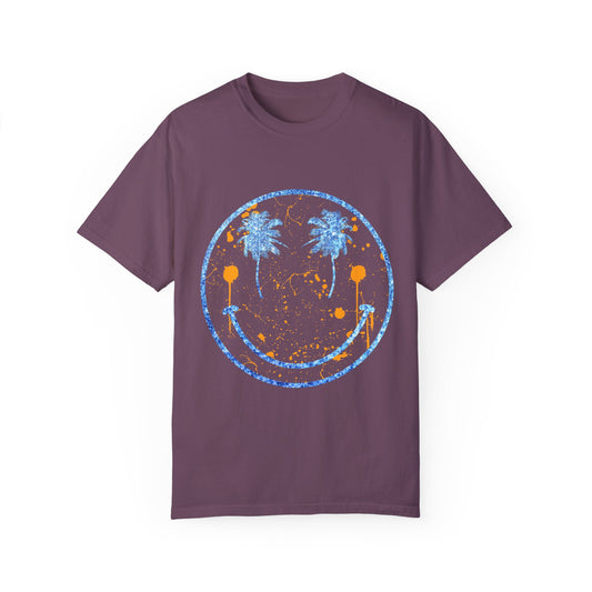 "Embrace summer vibes with our 90s Aesthetic Happy Face Paint Splatter Shirt, featuring a nostalgic design with palm tree eyes. This trendy unisex cotton tee is perfect for beach days, music festivals, and pool parties. Made from soft-washed ring-spun cotton, it offers a comfortable and relaxed fit, ideal for all-day wear. Get ready to shine in this retro-inspired shirt, designed for men, women, and teens!