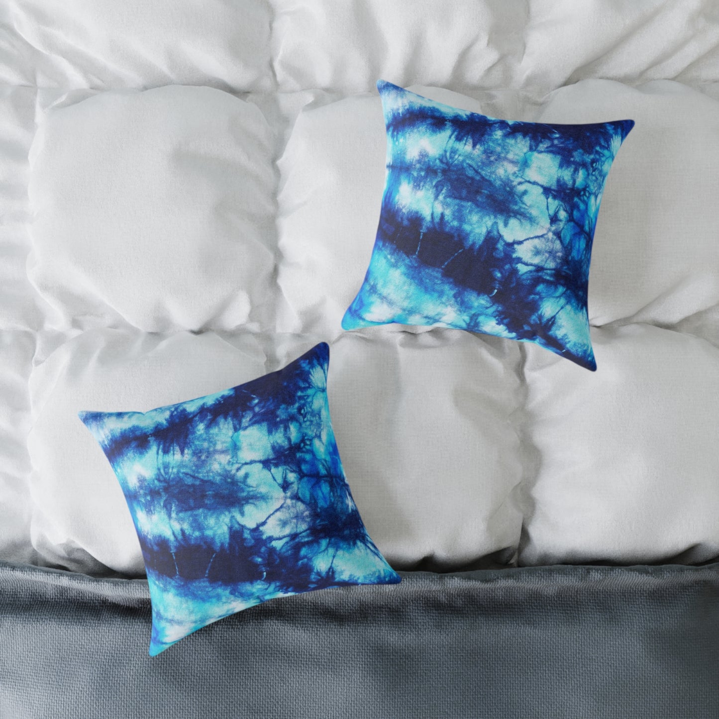 Blue Tie Dye Square Poly Canvas Pillow with a playful design, perfect for adding a pop of color to any room. Ideal for lounging or snuggling, this eye-catching pillow enhances your home decor while reflecting your unique style.