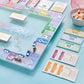 “Monopoly, But Make It Chic” ✨ Aura Collection Glass Monopoly Game
